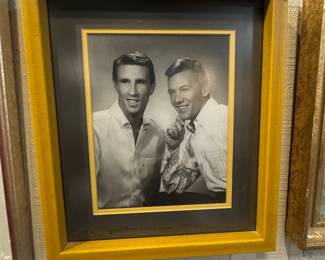 framed black and white portrait of the musical duo The Righteous Brothers, featuring members Bill Medley and Bobby Hatfield. 