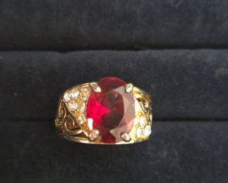 GoldTone Ring with Red Oval Stone and Pave Accent Stones