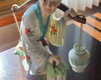 Vintage Porcelain Figurine of an Elderly Woman Carrying Water and Vegetables, Chinese