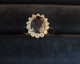 Oval Cut Dark Gemstone with Diamond Halo Ring