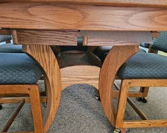 Oak Dining Table with Four Upholstered Chairs with Casters fourth image