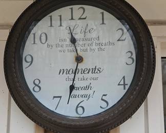 Inspirational Quote Wall Clock  Life isnt measured by the number of breaths we take but by the moments that take our breath away