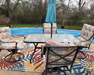 Wrought Iron Patio Furniture, 4 Rocking Chairs, Table, Cushions, and Rug