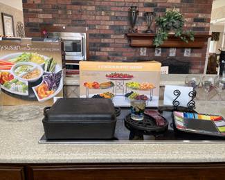 Cast Iron Skillets, Lazy Susan and Lots of Wine Glasses