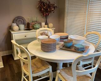Kitchen table,  Pottery Barn chairs, and set of dishes