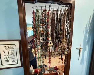 multiple necklaces and bracelets
