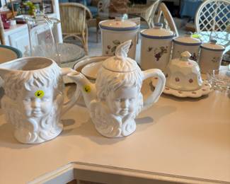 Cherub ceramic pitcher