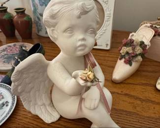 White Ceramic Cherub Figurine with Pink Ribbon