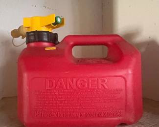 NoSpill Red Plastic Gasoline Can with Yellow Spout