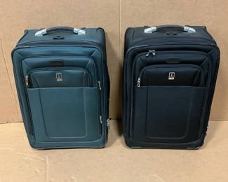 Pair Of Travelpro Suitcases
