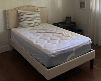 Twin Bed beige with studded backboard and 5 year old mattress was $200 now $175