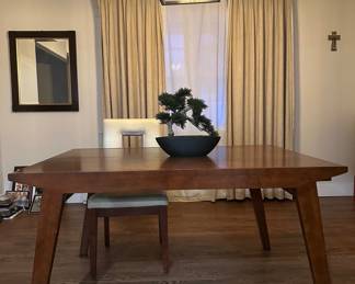 Wooden table by wwwSitcomFurniture.com Expendable to seat 6-8 closed Length 4'8" Width 3.3" Opened Length 7'11" Width  is 3.3" 