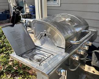 Charbroil grill with side burner used twice in excellent condition 