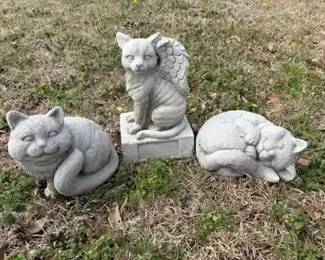 Three Concrete Cat Statues