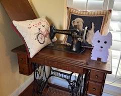 Hand-painted Singer Trundle with extra.                                                                                                                                  