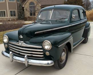 1947 Ford Super Deluxe Sedan 4 Door, 239 Cubic Inch 100 HP Flathead V-8, 3 Speed Manual Transmission, 6 Volt, Dark Green, VIN #1669868 