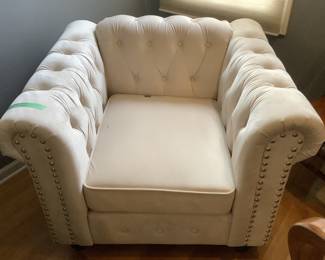 The matching chair measures 38” w x 34” d x 29” h.  Presale $295