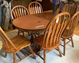 Dining table and 6 chairs, pads and two leaves.  Presale $295