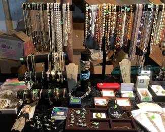 More costume jewelry and 1940s doll