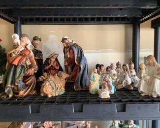 12 inch resin nativity set and a small scale set