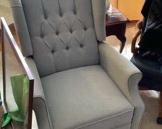 Recliner in a light green fabric. Measures 26” w x 36” d x 40” h.  Presale $125