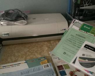 Cricut machine plus accessories.