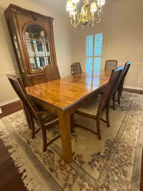 Dining Table and 6 Caned Back Chairs incudes 2 leaves and table pad protectors in amazing condition.