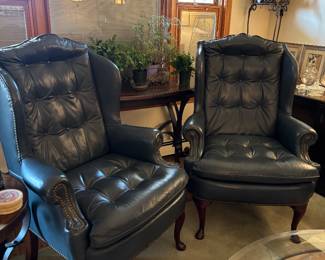 Stunning leather wing back arm chairs