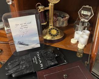 Vintage candlestick phone, leather gloves