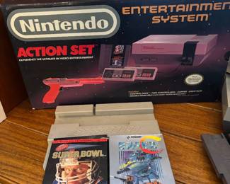 In box Nintendo NES set with games