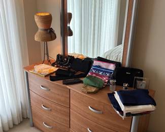 Dresser, purses, lamp