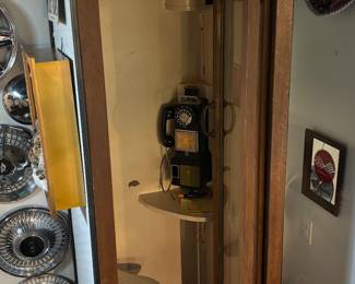 Antique phone booth with phone