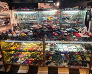 Part of the massive model car collection. Lighted Display Cabinets