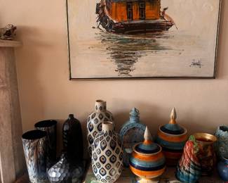 Decorative objects include a large assortment of crystal, glass, and porcelain pieces including vases, serving pieces, bowls, figurines, and display items. The sale also includes vintage clocks, decorative metal objects, carved sculptures, Asian decorative pieces, and a variety of unique collectibles.