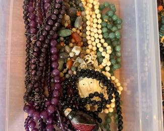 Fashion accessories include vintage scarves, select clothing pieces, and accessories.