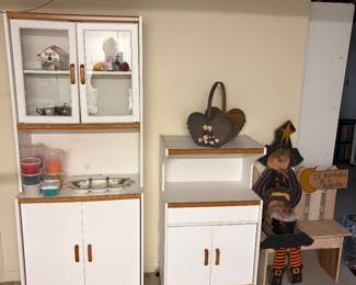 Matching pair of kitchen cabinets, Halloween bench, and witch, 
