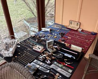 Large variety of costume  jewelry, and watches.