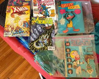 Comic books. Pink Panther, Daffy, duck, X-Men, fantastic four, avengers and Richie Rich.
