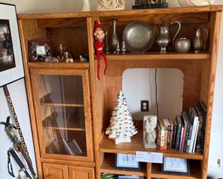 Silver plate, cream,  sugar, salt and pepper, ceramic Christmas tree, vintage posters, and entertainment center.