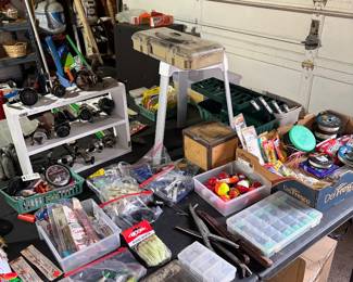 Large selection of fishing reels, bait and accessories.