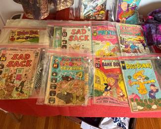Comic books. Sad Sak, Bugs Bunny, Richie Rich. Battlestar, Galactica, and porky pig.
