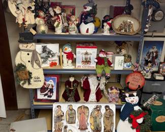 Sentry lock and key safe, metal shelving, vintage manger pieces, Santa’s and snowmen.