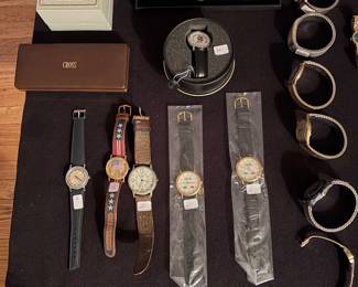 Vintage Kodak celebration watches, vintage $6 million man and Mickey Mouse watches men’s wrist watches 14 karat gold plated cross, pen, set, camp good days logo watch, women’s Seiko in variety of men’s wrist watches.