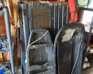 Portable ice fishing hut, ice fishing sleds and life preservers. 