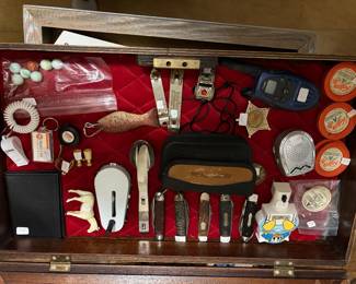 Nortier’s and Orbaker’s dairy milk, caps, Donald Duck, nightlight, Olympus camera, pocket knives, vintage marbles, and much more