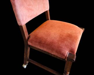 Vintage suede chair on casters