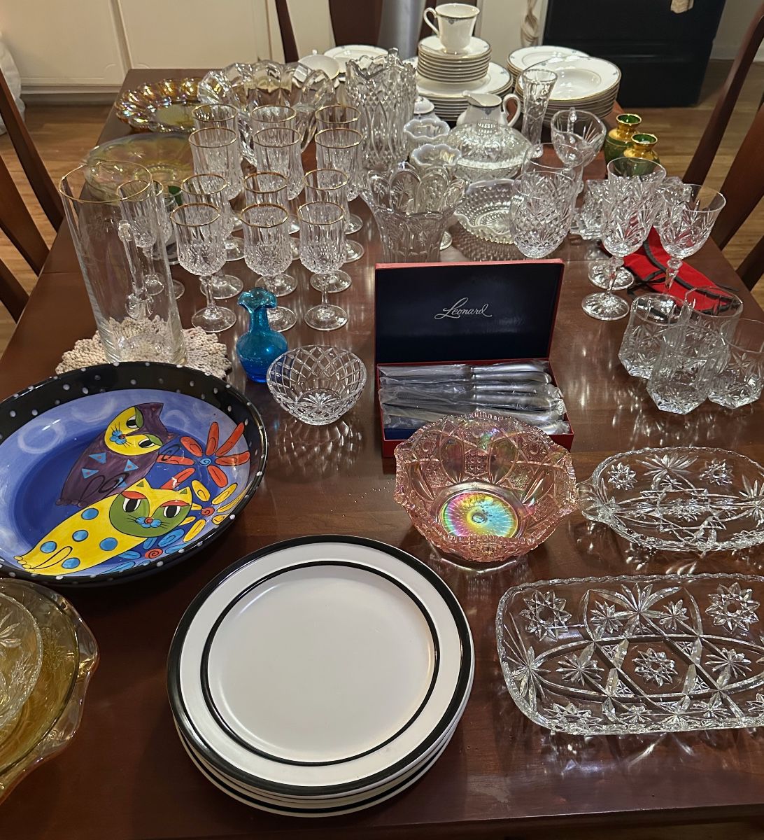 Solid Wood Dining Table seats 6 and has custom pads to go with it