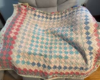 Crib quilt from flour sack and other fabrics