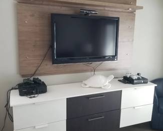 Media console; flat screen TV with bracket; floating shelf