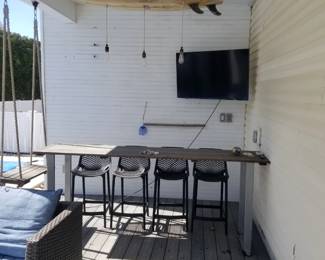 High top bar with Compamia Air Patio Bar Stools in Dark Gray